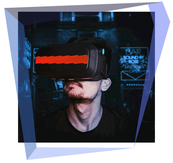 Person wearing VR headset in a dimly lit bar, neon signs in background.